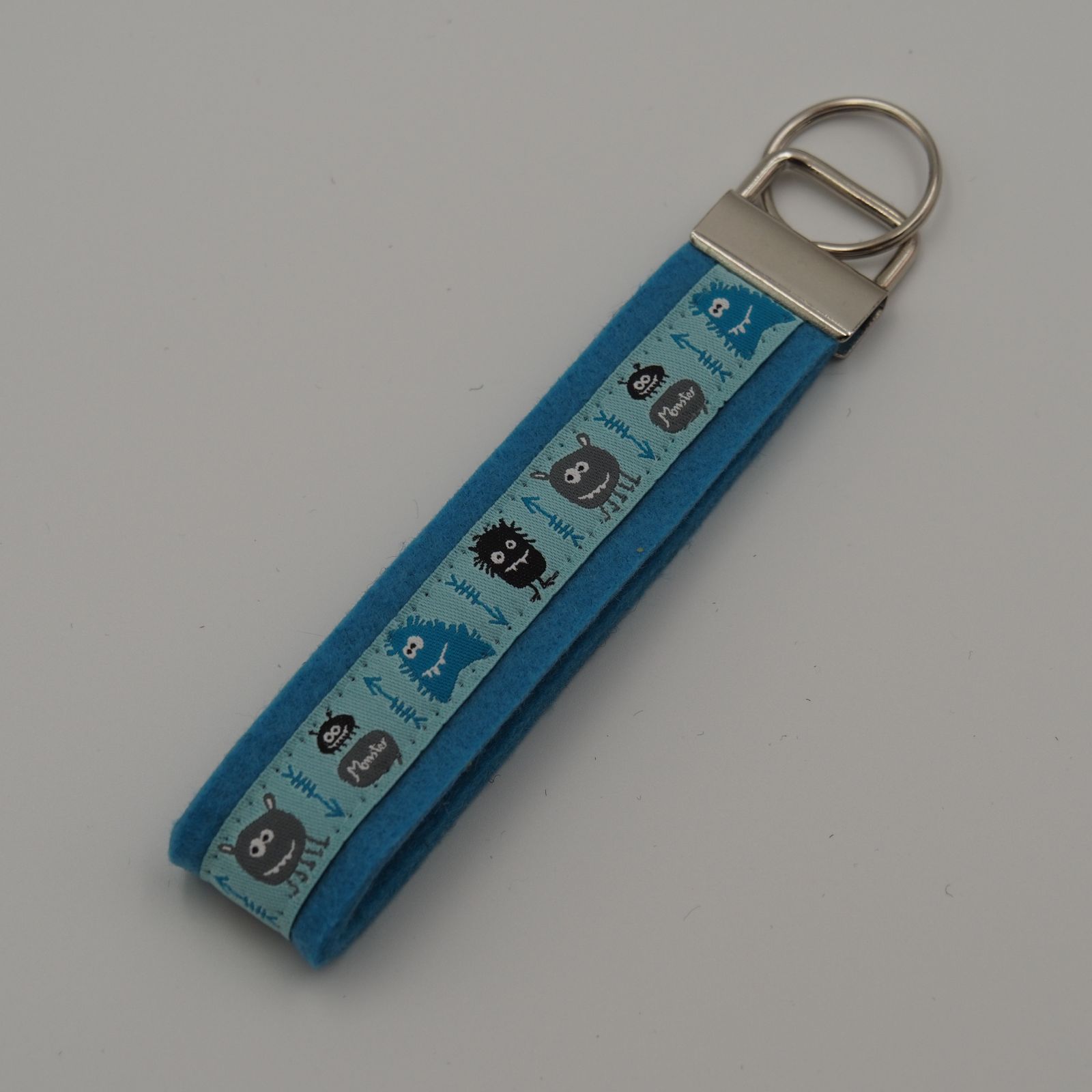 Schlüsselanhänger Monster 3, türkis