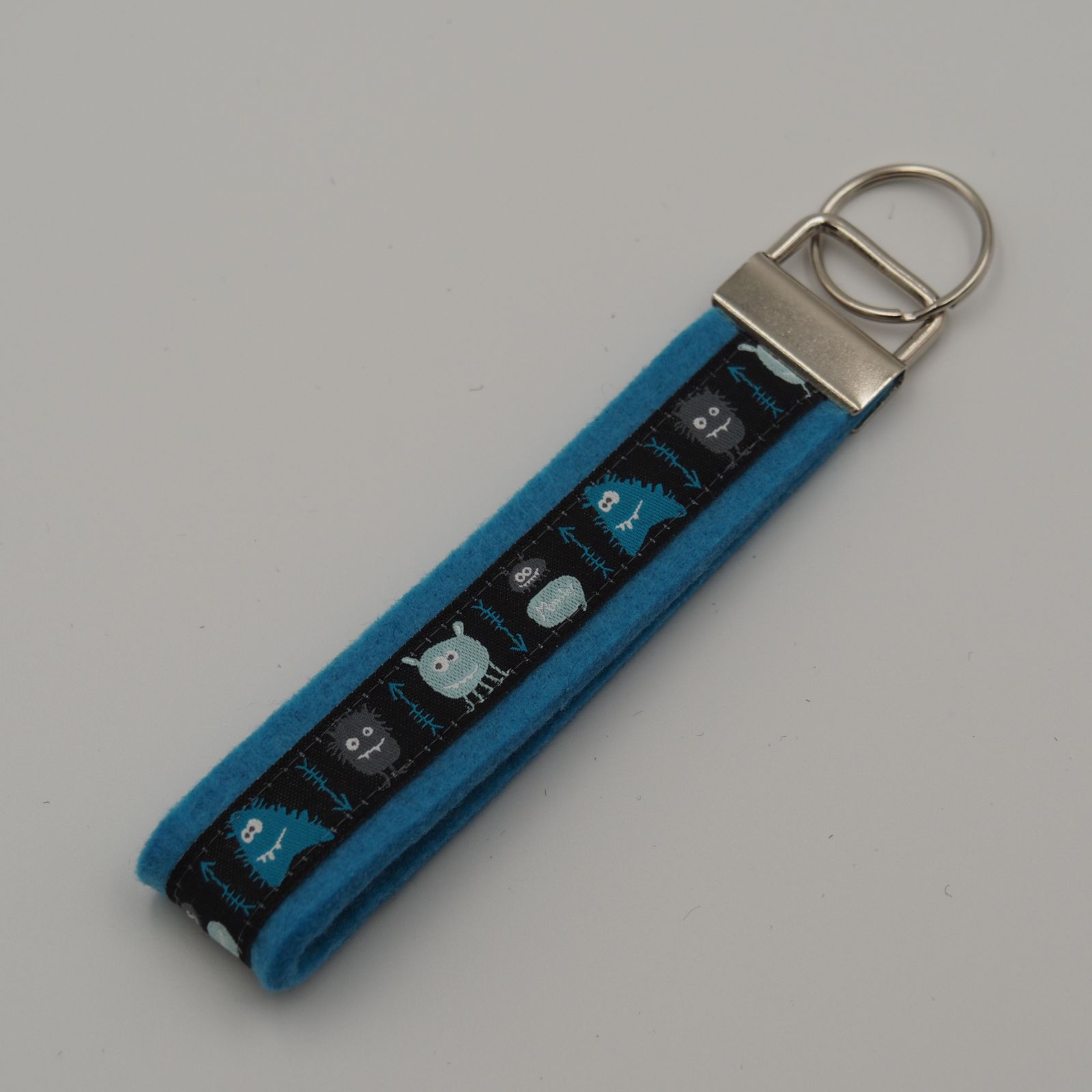 Schlüsselanhänger Monster 1, türkis