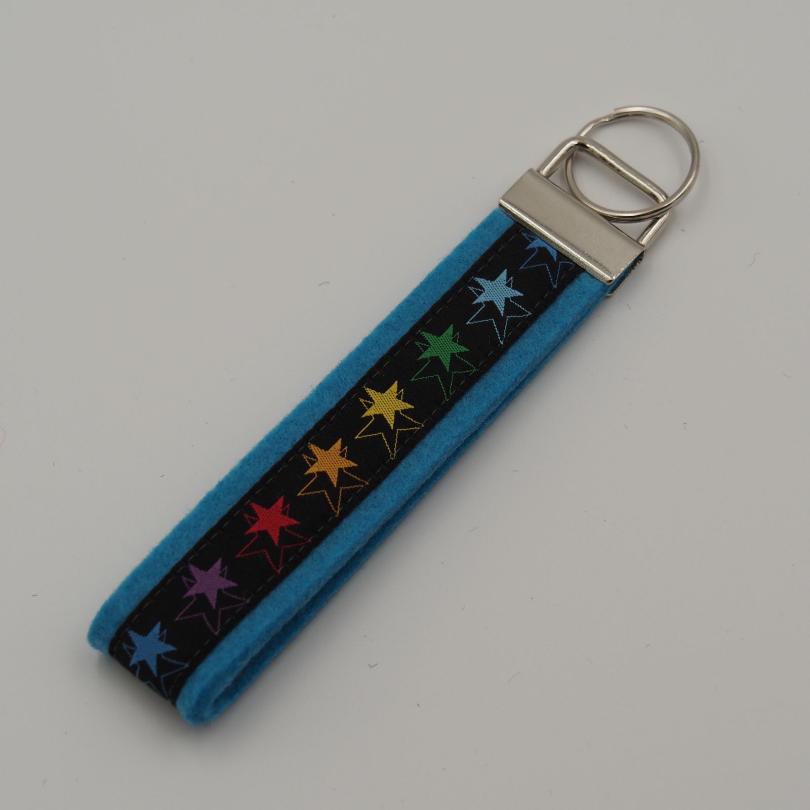 Schlüsselanhänger bunte Sterne, türkis